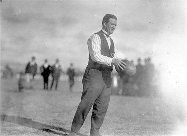 SLSA-PRG-280-1-23-135 Man holding football at Thebarton Oval 1921