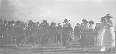 SLSA-PRG-280-1-23-268 Women competing in a cotton winding race at Thebarton 1921
